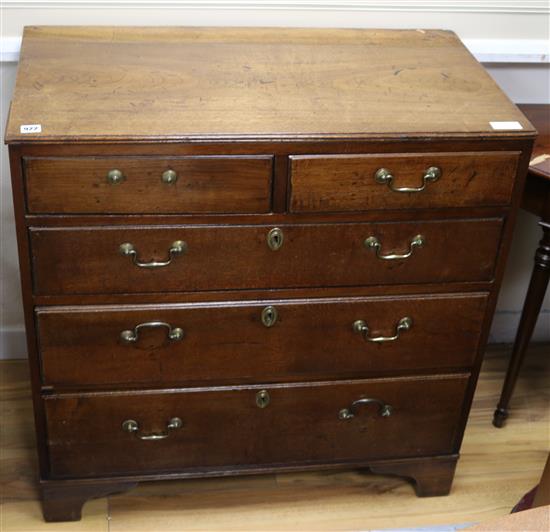 A Regency oak chest of five drawers, W.2ft 11in.